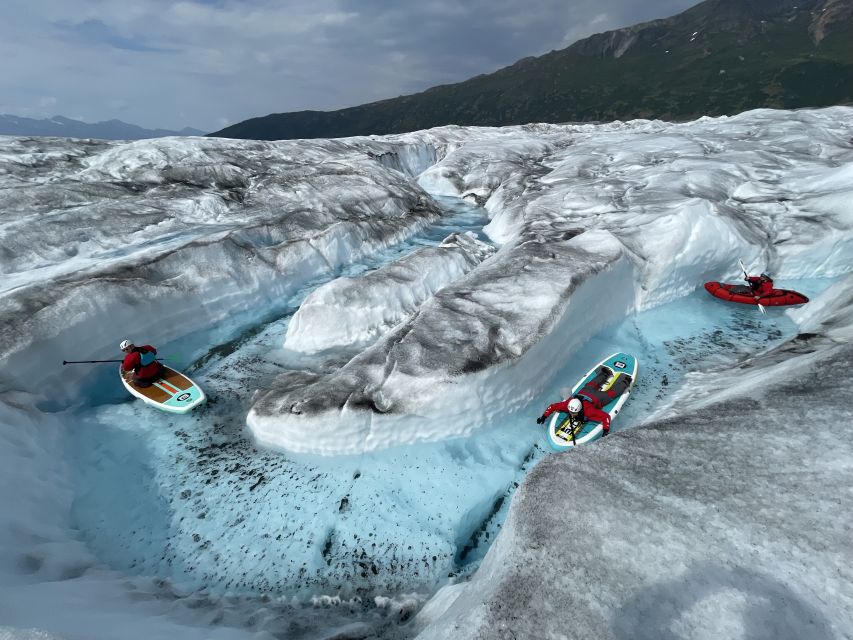 Anchorage: Knik Glacier Helicopter and Paddleboarding Tour - Landing on Knik Glacier Pools: The Feeling of Quiet Ice Country